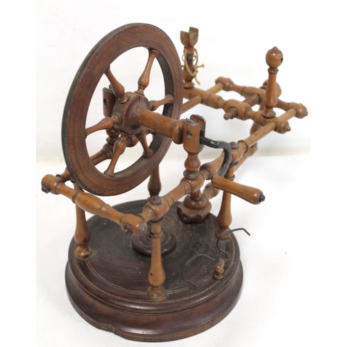 264 - Early 19th century treen bobbin winder with spoked wheel on circular plinth base, 25cm high; also a ... 