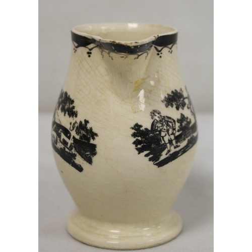 268 - Early 19th century Wedgwood Drabware jug of baluster form with gilt initials, further gilding to rim... 