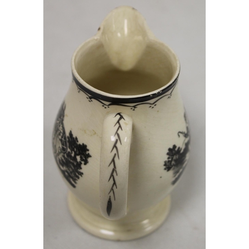 268 - Early 19th century Wedgwood Drabware jug of baluster form with gilt initials, further gilding to rim... 