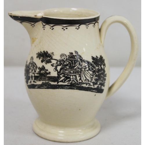 268 - Early 19th century Wedgwood Drabware jug of baluster form with gilt initials, further gilding to rim... 