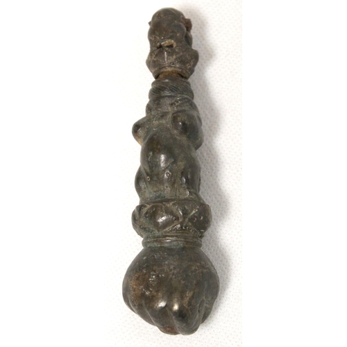 290 - Eastern bronze weight or toggle with ram's head finial, moulded figure of buddha as a child and fist... 