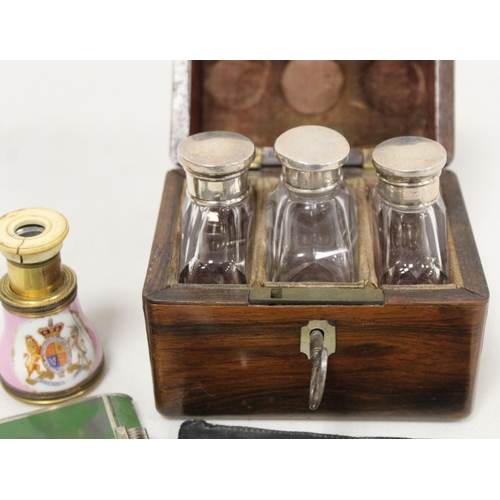 292 - Victorian rosewood box containing three small glass scent bottles with white metal caps; small silve... 