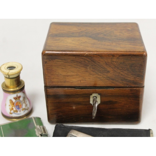 292 - Victorian rosewood box containing three small glass scent bottles with white metal caps; small silve... 