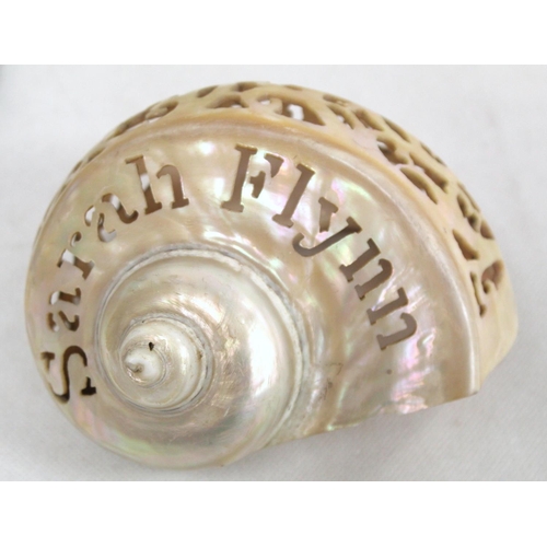 297 - Carved pierced mother of pearl shell inscribed 