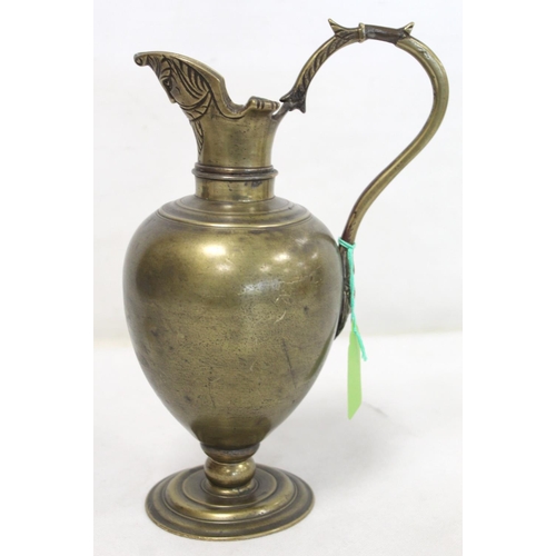 321 - Antique Continental bronze wine ewer, probably Italian 16th century, of baluster form with mask head... 