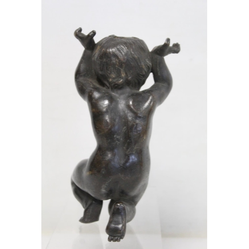 322 - Cast bronze figure of a putto wrestling with a serpent, on naturalistic plinth base, a.f., 27cm high... 