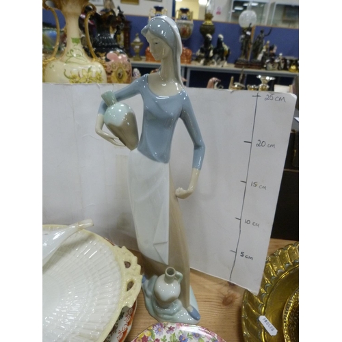 88 - Spanish-style porcelain water carrier figure modelled as a female, Goss crested ware cup, small Pool... 