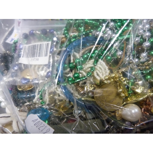 224 - Large bag of costume jewellery including beads, brooches, watches etc.