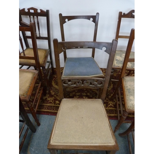 297 - Assorted bedroom chairs to include three matching spindle-back chairs.  (8)