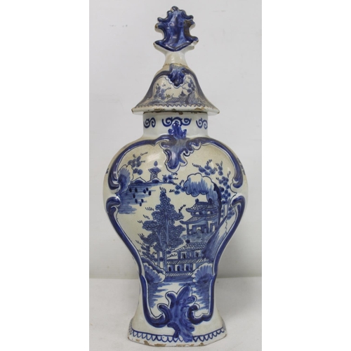 521 - Dutch Delft De Klaauw blue and white covered vase of baluster form, decorated in the Chinese manner ... 