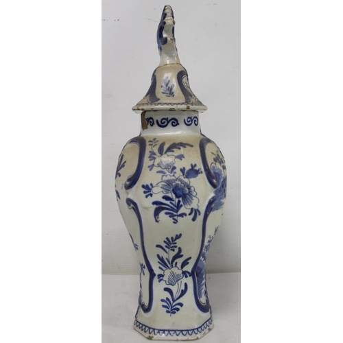 521 - Dutch Delft De Klaauw blue and white covered vase of baluster form, decorated in the Chinese manner ... 