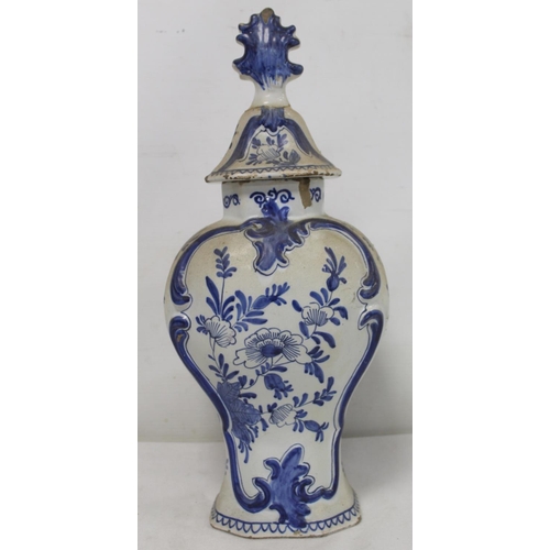 521 - Dutch Delft De Klaauw blue and white covered vase of baluster form, decorated in the Chinese manner ... 