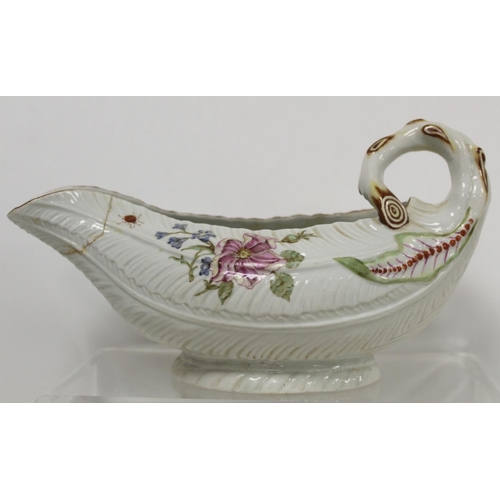 522 - 18th century English porcelain cos lettuce leaf moulded sauce boat with naturalistic branch scroll h... 