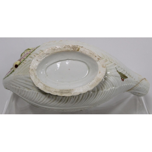 522 - 18th century English porcelain cos lettuce leaf moulded sauce boat with naturalistic branch scroll h... 