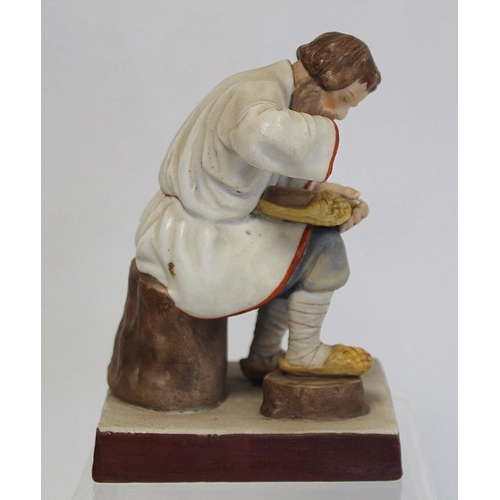 524 - Russian Moscow/Gardner bisque porcelain figure of a seated man braiding lapti (bast shoes). Painted ... 