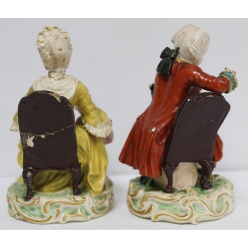 525 - Pair of 19th century porcelain figures of a seated boy reading a book and girl tatting, in 18th cent... 