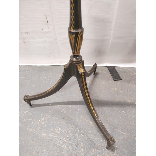 532 - 19th century ebonised wood pole screen stand on a tripod base; also a mahogany and silk two section ... 