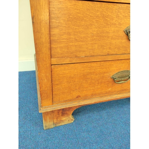 560 - Attributed to Arthur Simpson of Kendal. Arts & Crafts oak side cupboard with plain pediment and ... 