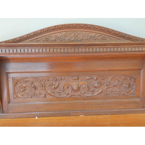 561 - Late 19th century light oak sideboard, the arched raised back with dentil cornice and foliate carved... 