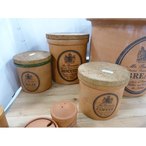 103 - Terracotta bread crock, 'Mr Brannam's Celebrated Devon Terracotta' with associated lid, a similar bi... 