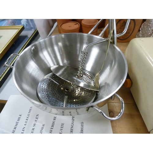 104 - Set of Krups kitchen scales, measuring spoons and a metal purée mill.