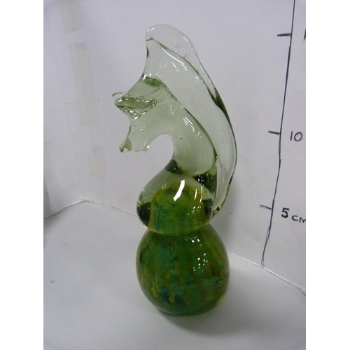 106 - Three Mdina glass seahorse paperweights and another glass paperweight modelled as a fish.  (4)