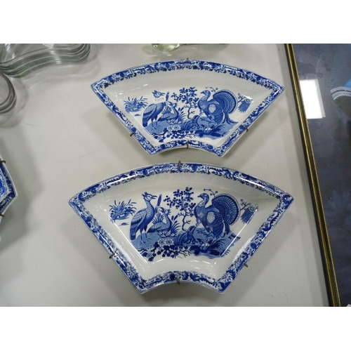 108 - Set of four Antique Chelsea-style wall hanging blue and white pottery shaped crescent dishes decorat... 