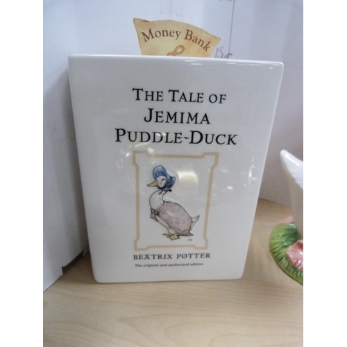 111 - Border Fine Arts World of Beatrix Potter Jemima Puddle-duck money bank, similar Jemima Puddle-duck b... 