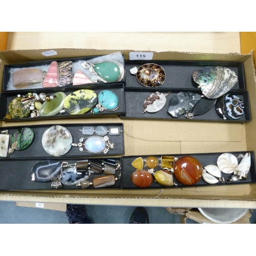 115 - Tray containing a collection of costume pendants including pebble, moonstone-style, agate-style.