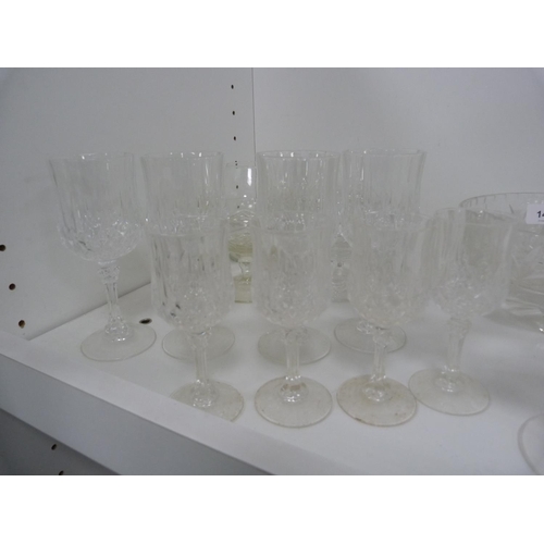 141 - Glass and crystal to include a set of four whisky tumblers, dessert bowls, wine glasses, liqueur gla... 