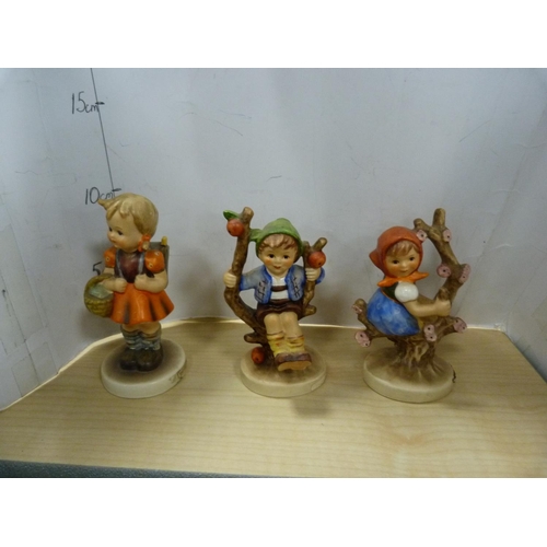 195 - Group of Goebel Hummel figures including Chimney Sweep, Apple Tree Girl, Apple Tree Boy, Schoolgirl,... 