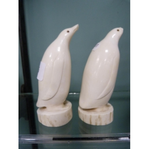 205 - Pair of ivory-style figures of penguins (one a/f).