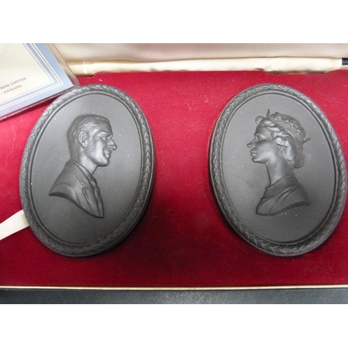 218 - Pair of Wedgwood Black Basalt medallions depicting The Prince Philip, Duke of Edinburgh and HRH Quee... 