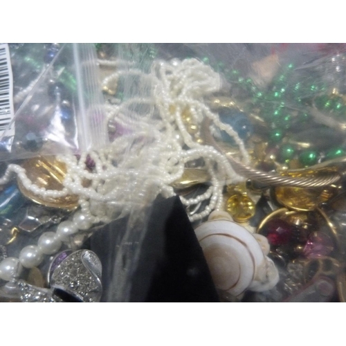 224 - Large bag of costume jewellery including beads, brooches, watches etc.