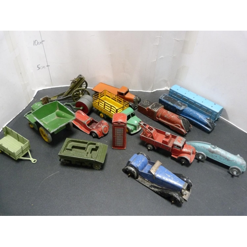 231 - Diecast models, mainly Dinky by Meccano, including truck, dumper, Dodge truck, tank, cannon, farm tr... 