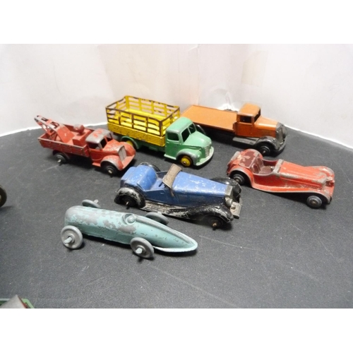 231 - Diecast models, mainly Dinky by Meccano, including truck, dumper, Dodge truck, tank, cannon, farm tr... 