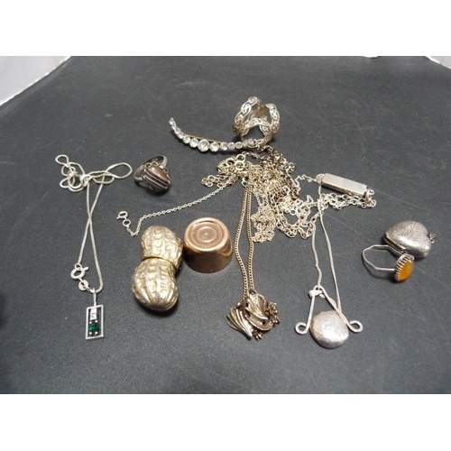 234 - Collection of mainly silver jewellery including ingot on chain, pendant modelled as a heart-shaped l... 