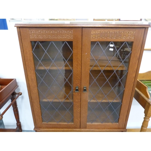 288 - Oak veneer two-door bookcase.