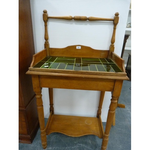 289 - Victorian pine wash stand with later tiled top.