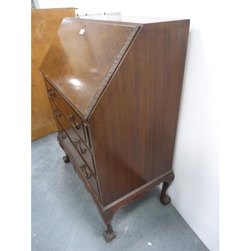 292 - Walnut and mahogany writing bureau on ball and claw feet.