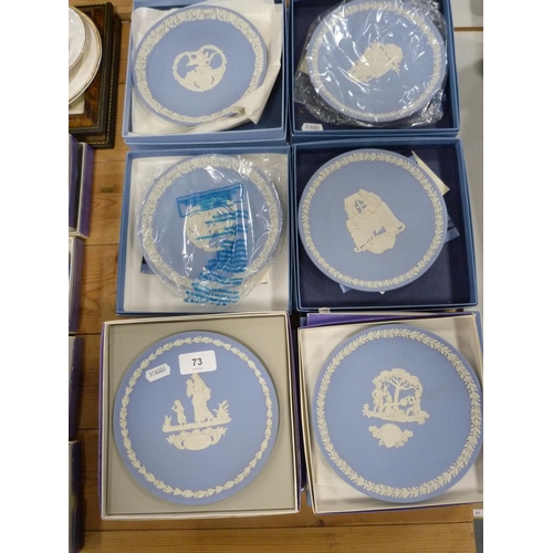 73 - Assorted Wedgwood blue Jasper Ware boxed plates.  (16)