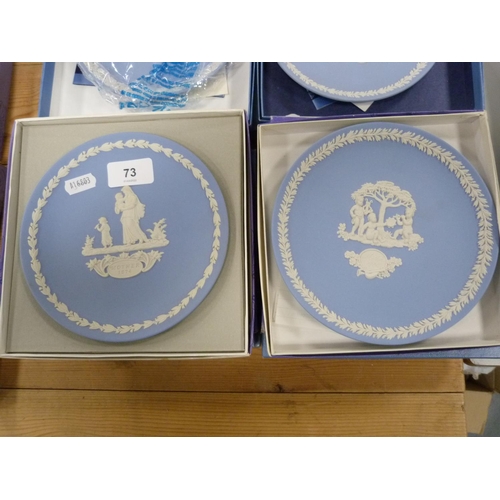 73 - Assorted Wedgwood blue Jasper Ware boxed plates.  (16)
