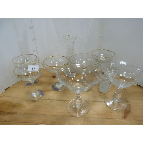 87 - Five Babycham glasses, pair of champagne glasses and another etched champagne glass, Bohemia cut gla... 