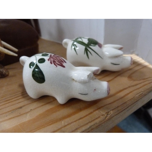 92 - Beswick foal and other horse ornaments, Wemyss-style pig ornaments, African-style ornaments, wooden ... 