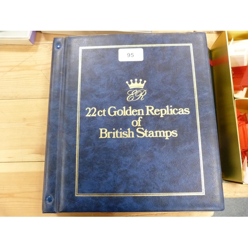 95 - Folder containing 22ct golden replicas of British stamps.