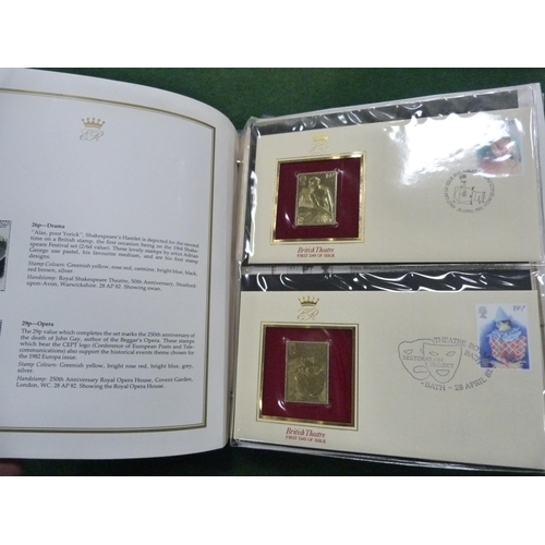 99 - Folder containing 22ct golden replicas of British stamps.