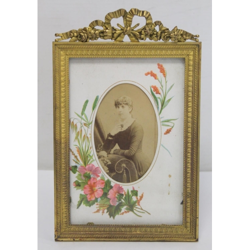 333 - 19th century brass photograph frame with floral ribbon pediment and easel back, to fit image 14cm x ... 