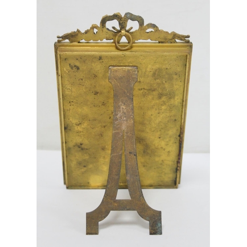 333 - 19th century brass photograph frame with floral ribbon pediment and easel back, to fit image 14cm x ... 