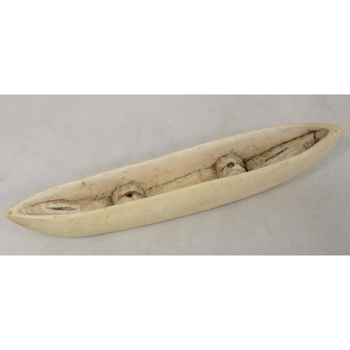 336 - Late 19th/early 20th century African carved ivory pipe with mask terminal and ribbing to body, 45cm ... 