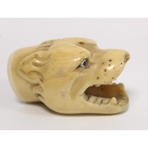 341 - 19th century ivory walking stick finial in the form of a leopard's head, 5.5cm long and two other fi... 